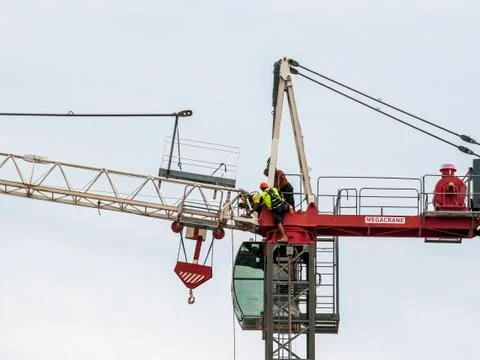Erecting a Tower Crane. Stock Photos