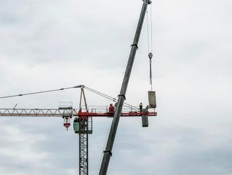 Erecting a Tower Crane. Stock Photos