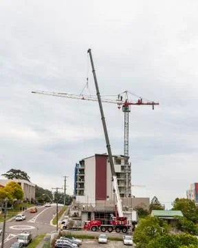Erecting a Tower Crane. Stock Photos