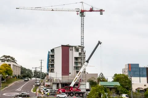Erecting a Tower Crane. Stock Photos