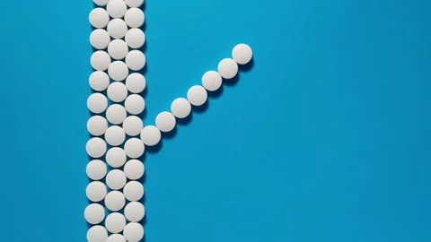 Erection from a tablets on a blue background (stop motion) Stock Footage 141299144