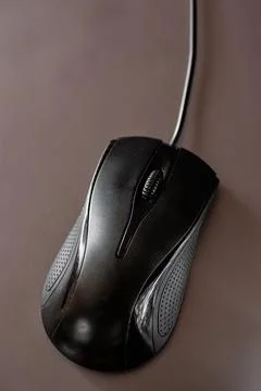 Ergonomic Computer Mouse on Dark Background Stock Photos