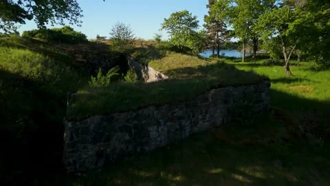 Erial Drone Flyover Above Dalaborg Castle Ruins Surrounded by Forest and Lake Stock-Footage 330914922