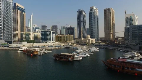 Erial drone view of Dubai marina harbor with boat yacht Stock Footage 100867577