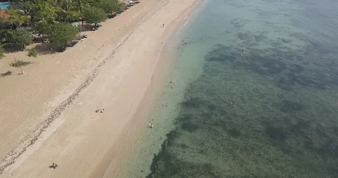 Erial view of people at Sanur Beach Stock Footage 129772007