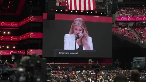 Erika Kirk on screen as the crowd responds at the Charlie Kirk memorial service Stock Footage 345298610