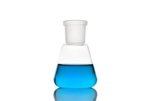 Erlenmeyer flask with blue liquid on white background Stock Photos
