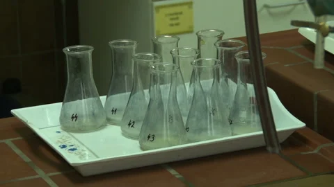Erlenmeyer flasks signed in black marker. Stock Footage 153814023