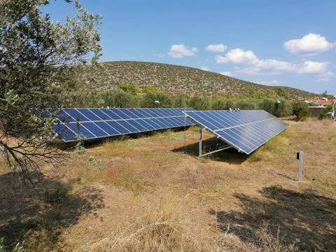 Ermioni greece solar panel photovoltaic electricity array in olive grove Stock Photos