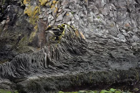 Eroded basalt column formations at Londrangar, Iceland Stock Photos