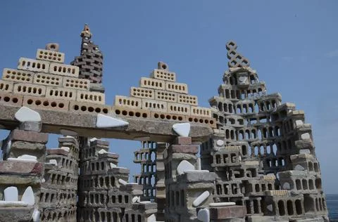 Eroded brick and cement block Sculpture Stock Photos