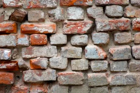 Eroded brick wall Stock Photos