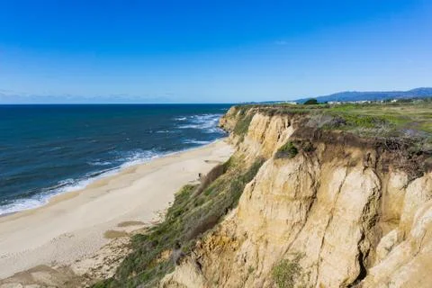 Eroded cliffs and sandy beach, Pacific Ocean, Half Moon Bay, California Stock Photos