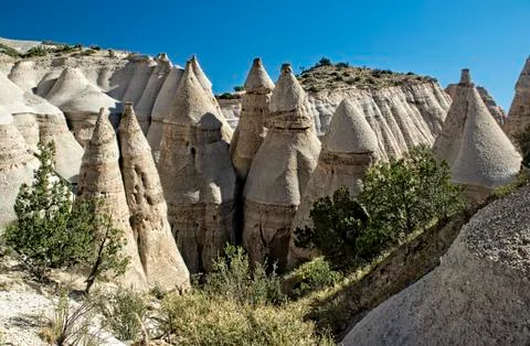 Eroded cliffs form strange rock formations at Tent Rocks National Monument Stock Photos