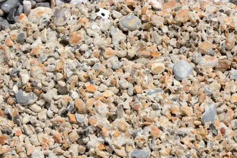 Eroded concrete on beach Foto stock