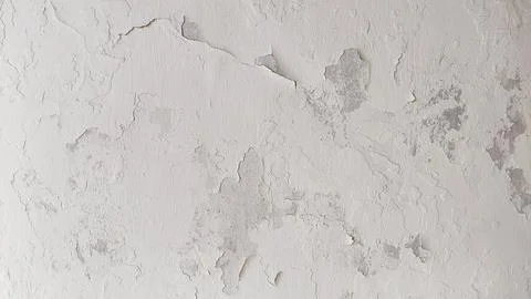 Eroded concrete wall in horizontal layout showing aging, weather marks, and.. Stock Photos