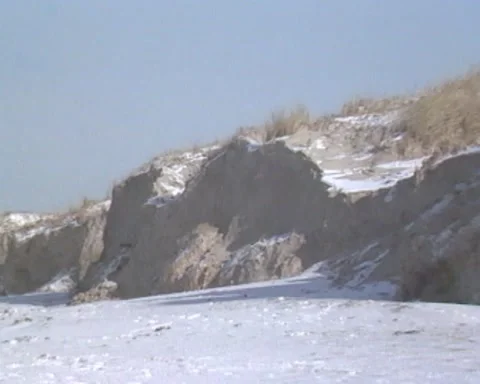 Eroded dune front + zoom out beach, coastline Texel, Wadden Sea Stock Footage 167839474