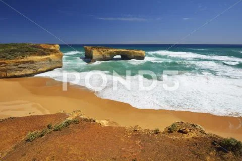 Eroded Limestone Rock In Ocean In Summer, London Arch, Port Campbell National
