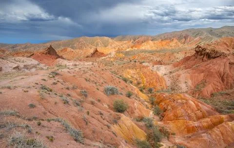 Eroded mountain landscape, sandstone cliffs, canyon with red and orange rock 스톡 사진