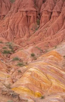 Eroded mountain landscape, sandstone cliffs, canyon with red and orange rock 스톡 사진