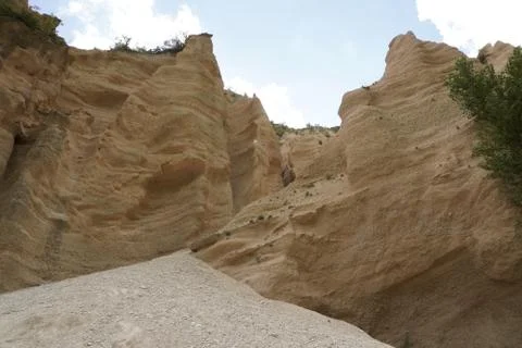 Eroded red breaches pinnacles cliff Stock Photos