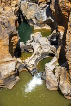 Eroded rock formations, canyon with steep orange-coloured rock cliffs with the 스톡 사진