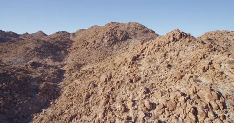 Eroded rocky hill in the dessert Stock Footage 68737726