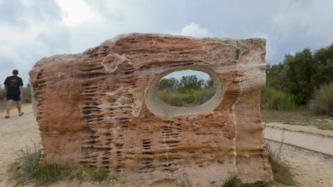 Eroded sandstone block with natural holes and layered textures in the Ebro .. Stock Footage 344804953