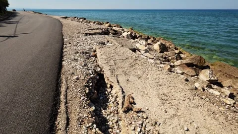 Eroded Seaside Road in Urgent Need of Repair Stock Footage 304686885