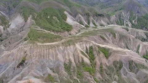 Eroded valley and rugged highlands - Geological Terrain and Terrain Formation Vídeo Stock 339576121