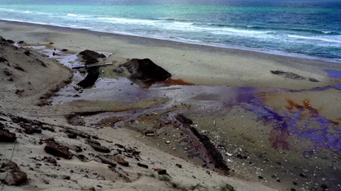 Eroded WWII Bunker Debris and Rust Pools on Beach, Nationalpark Thy, Denmark Stock Footage 336009205
