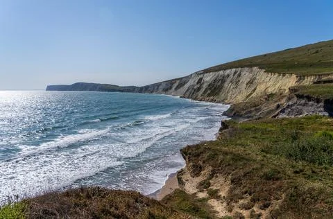 Eroding cliffs into the ocean in Compton Bay on the Isle of Wight Stock Photos