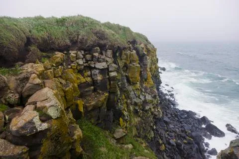Eroding coastal cliffs of St. Paul Island along the Bering Sea, St. Paul Island, Stock Photos