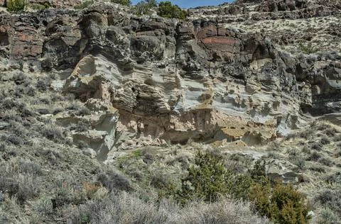 Eroding rocky mountain during daytime Foto stock