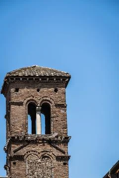 The eroding stonework of an old church bell tower in Rome Photos