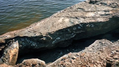 Erosion of the coast under the influence of the current. A large area of ??.. Stock Footage 245265466
