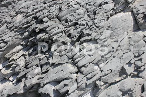 Erosion on coastline rock Stock Photos
