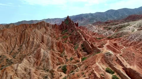 Erosion Mountain. Highland Formations Under Bright Sky. Red Spires Above Eroded Stock-Footage 339083886