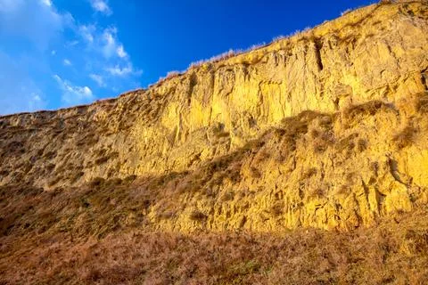 Erosion of rugged sandy cliffs Stock Photos