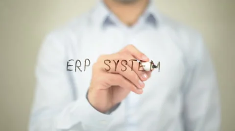 ERP System   ,  man writing on transparent wall Stock Footage 62634324