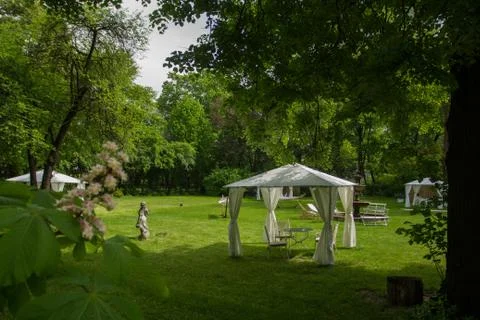 Errace restaurant in the park, with a table setting. Stock Photos