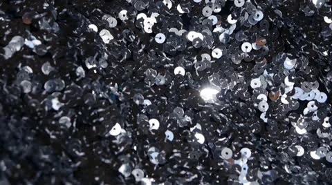 Erratic light on sequin fabric backgound texture timelapse Stock Footage 22571727