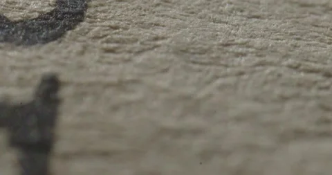 Erratic Macro Camera Movement Across Textured Paper with Typed Letters Stock Footage 344348936