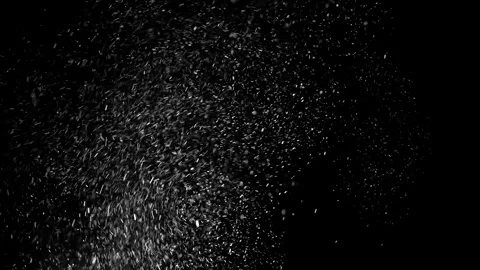 Erratic Swirling Ash Flakes Isolated on Black Stock Footage 322561206