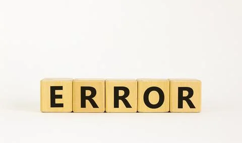 Error symbol. The concept word 'error' on wooden cubes on a beautiful white t 스톡 사진