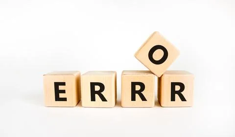 Error symbol. The concept word 'error' on wooden cubes on a beautiful white t 스톡 사진