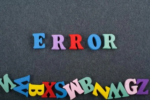 ERROR word on black board background composed from colorful abc alphabet bl.. Fotos de archivo