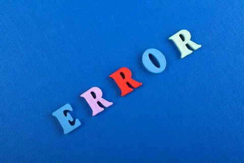 ERROR word on blue background composed from colorful abc alphabet block woode Fotos de archivo