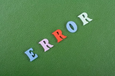 ERROR word on green background composed from colorful abc alphabet block wo.. Stock Photos