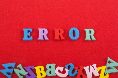 ERROR word on red background composed from colorful abc alphabet block wood.. Stock Photos